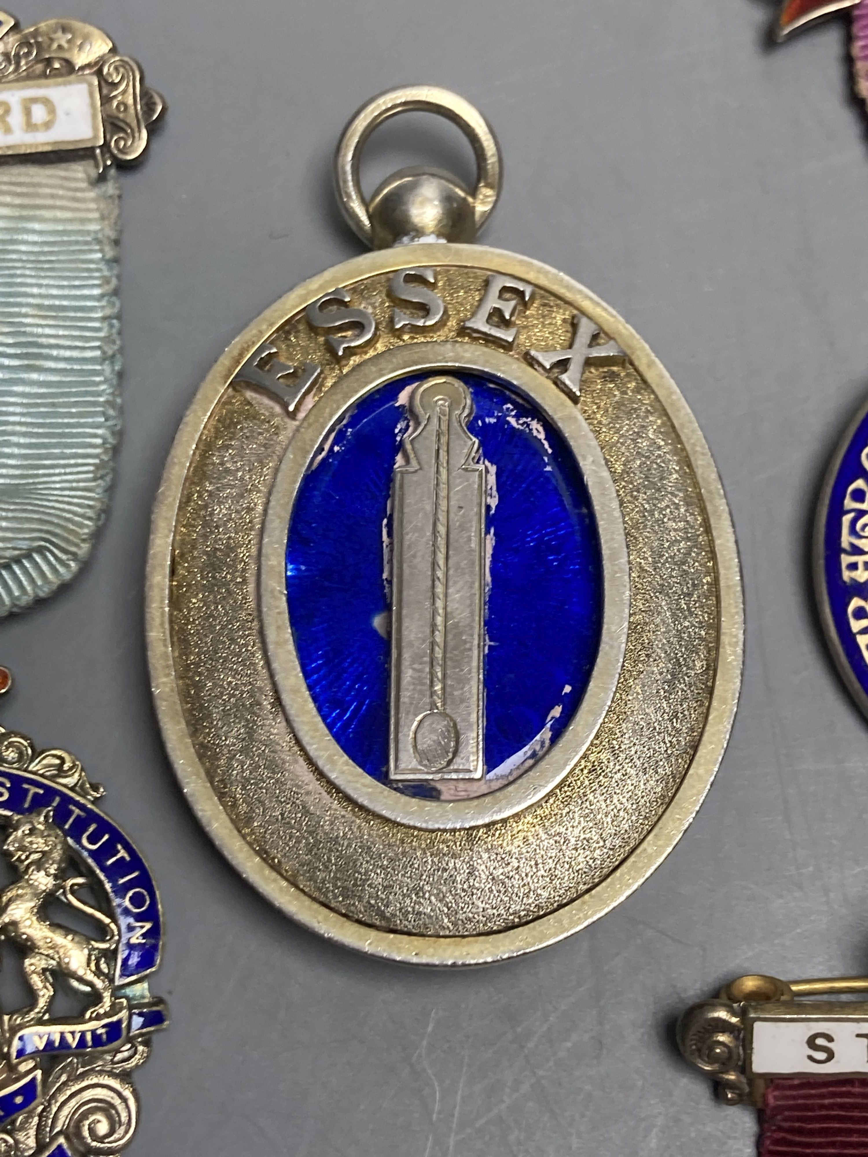 Six assorted early to mid 20th century silver and enamel masonic jewels,